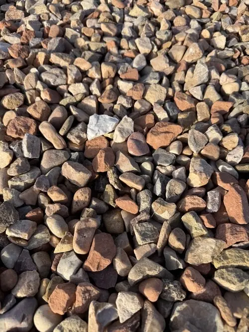 1 inch Cinnamon Spice landscape rock, close up